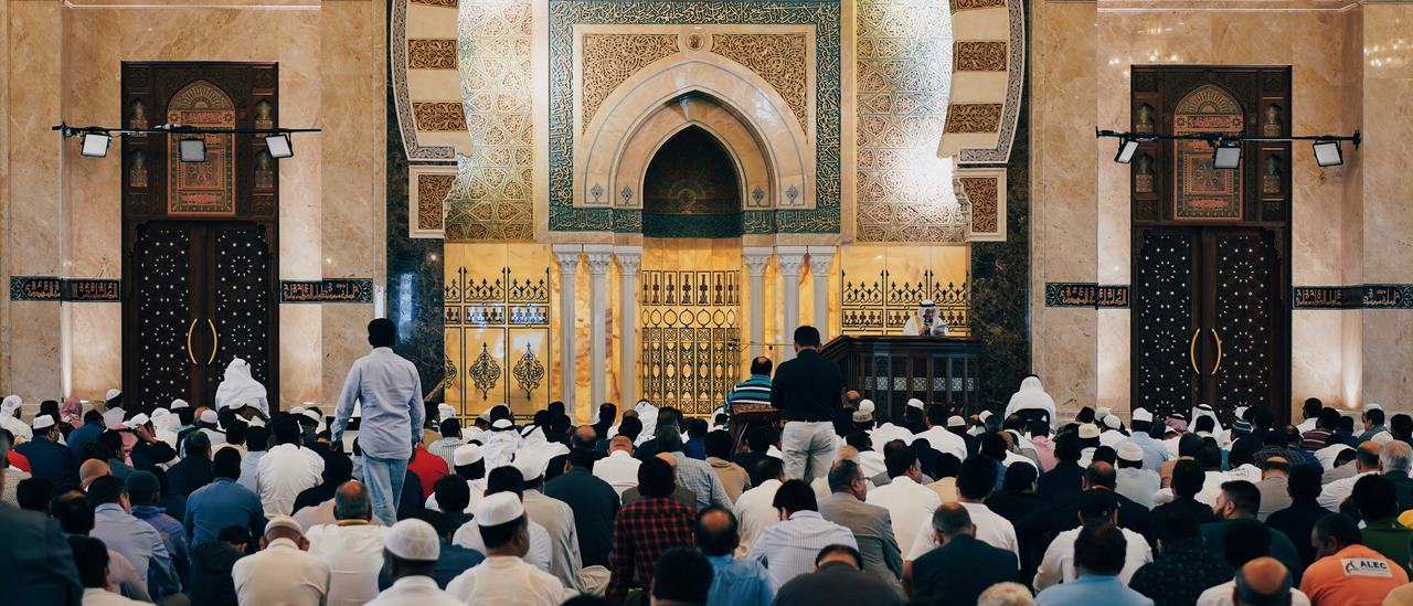 Rows of worshippers gathered shoulder to shoulder for Jummah prayer